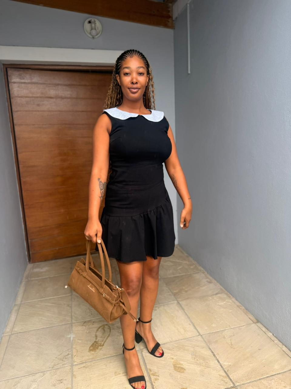 Black asymmetrical mini dress