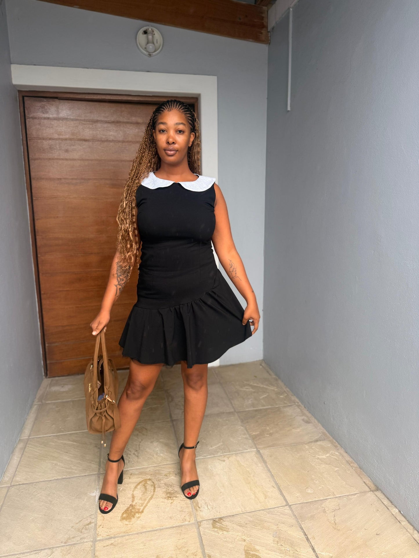 Black asymmetrical mini dress